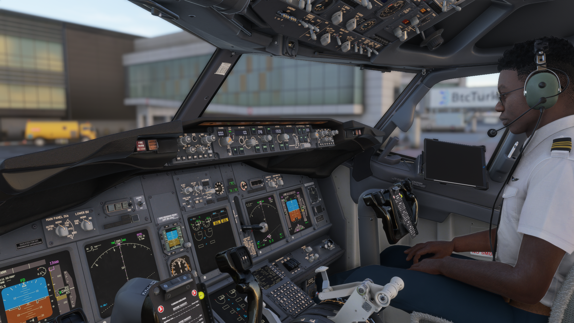 vTHY flight deck with a crew member preparing the aircraft